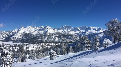 Snow-covered mountains, clear blue sky and crisp air