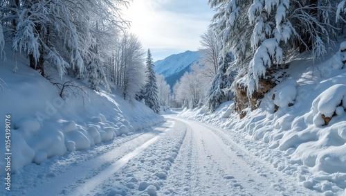 Scenic snow covered mountain road with icicles and snowdrifts