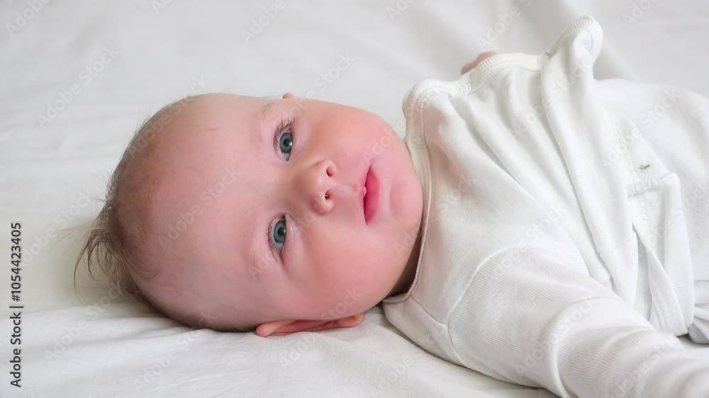 Portrait of little baby learning to smile Portrait of little baby learning to smile