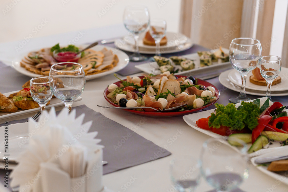 Elegant Table Setting with an Assortment of Gourmet Dishes and Refreshing Salads Elegant Table Setting with an Assortment of Gourmet Dishes and Refreshing Salads