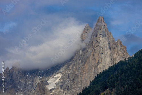 Quadro su tela The Petit Dru mountain summit displays rugged peaks and rocky formations against clear sky