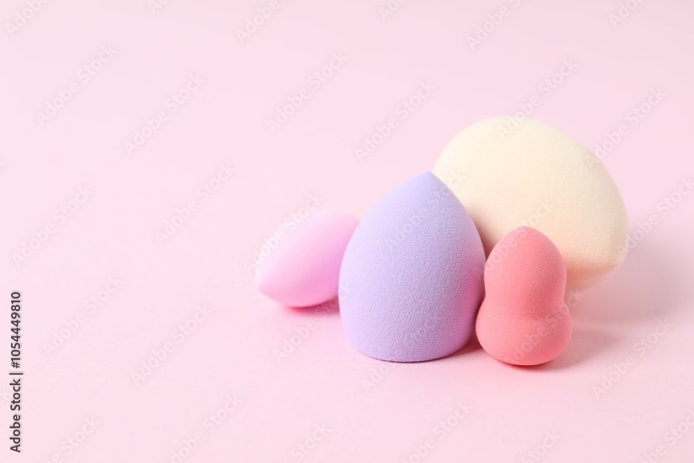 Beauty blender on a color background. Bright sponges for make-up cosmetics. Make-up products. Beauty concept Beauty blender on a color background. Bright sponges for make-up cosmetics. Make-up products. Beauty concept