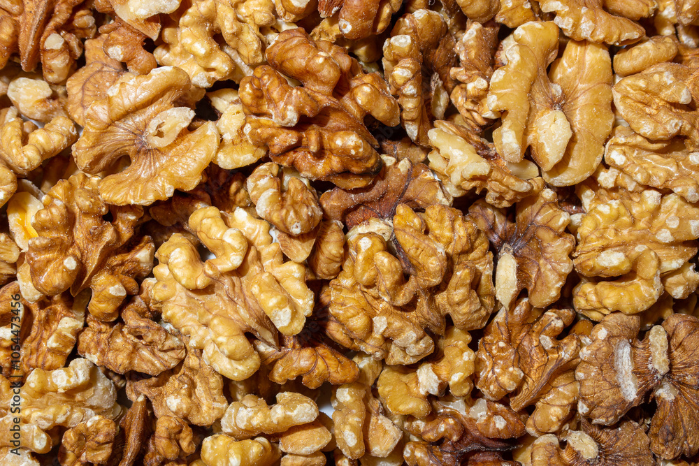 Scattered Shelled Walnuts. Background from Walnut. Natural High-Calorie Snacks Scattered Shelled Walnuts. Background from Walnut. Natural High-Calorie Snacks