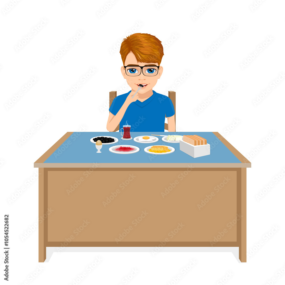 Orange-haired male student having breakfast Orange-haired male student having breakfast