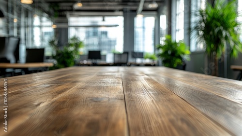 Wallpaper Mural wooden table on Blurred empty open space office. Abstract light bokeh at office interior background for design Torontodigital.ca