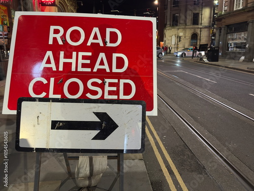 Road Closed sign with arrown to the right photo