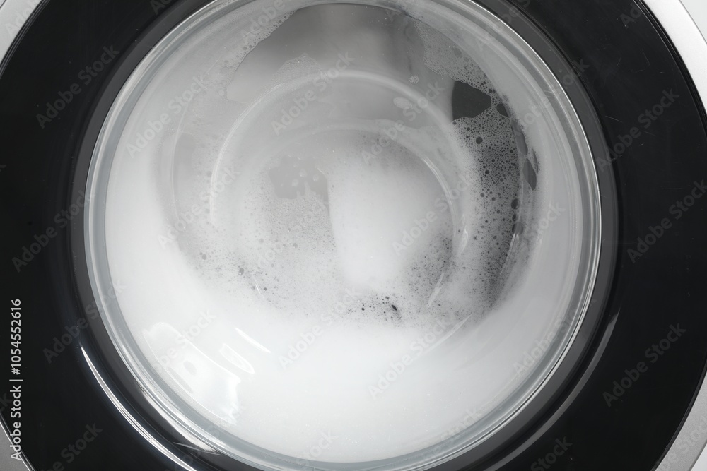 Washing machine with suds as background, closeup Washing machine with suds as background, closeup