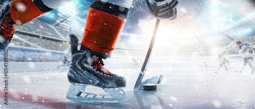 Canvas Print Hockey skates, stick and puck close-up