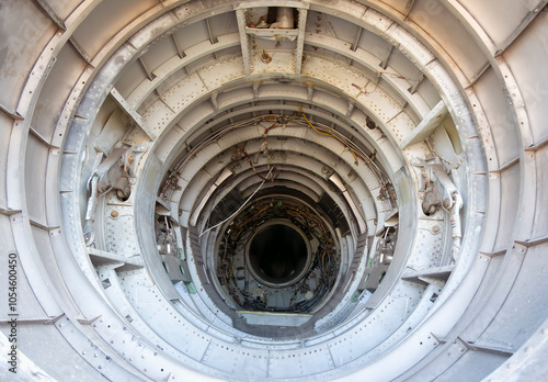 Space of a decommissioned fighter jet where a jet engine was mounted