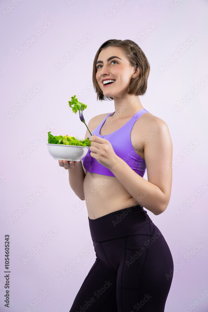 Full body length gaiety shot athletic and sporty young woman with healthy vegan food in standing posture on isolated background. Healthy active and body care by vegetarian lifestyle. Full body length gaiety shot athletic and sporty young woman with healthy vegan food in standing posture on isolated background. Healthy active and body care by vegetarian lifestyle.