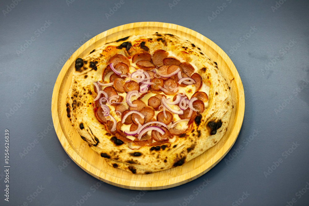 Traditional rustic artisanal pepperoni and onion pizza. Calabresa sausage pizza Traditional rustic artisanal pepperoni and onion pizza. Calabresa sausage pizza
