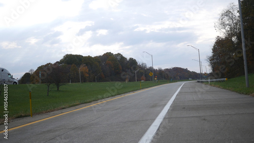 A wide shot of a highway on ramp on overcast day - 1