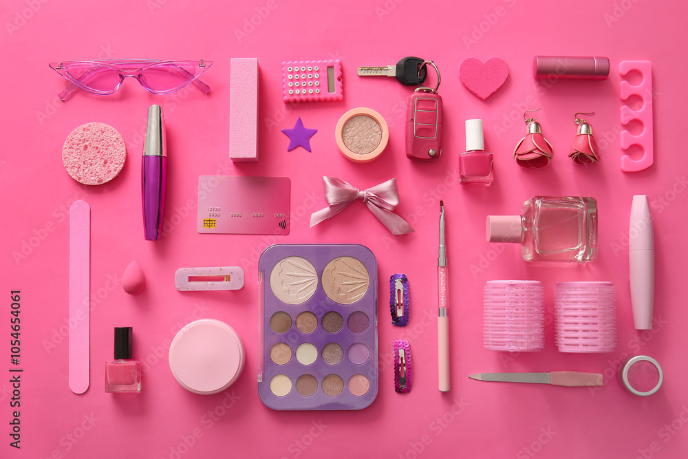 Composition with cosmetics, different accessories and car key on pink background Composition with cosmetics, different accessories and car key on pink background
