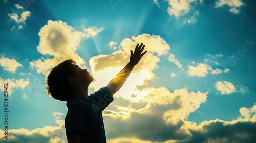 Child Reaching Toward Sunlight in Sky	 photo