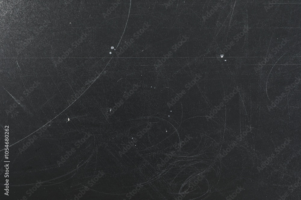 Texture of scratched black surface as background, closeup Texture of scratched black surface as background, closeup