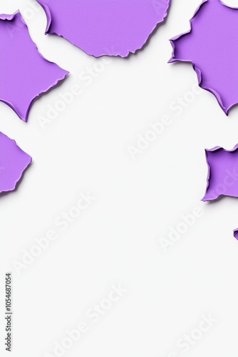 Abstract purple torn paper creating a dynamic backdrop on a clean white surface. photo