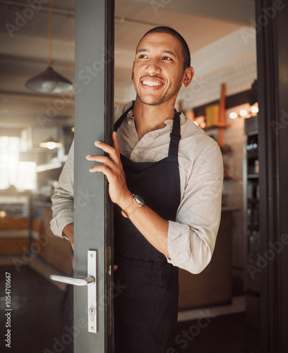 Happy, man and business owner at entrance of cafe with welcome, customer service and hospitality industry. Smile, male waiter and open door with invitation, startup and breakfast store for restaurant photo