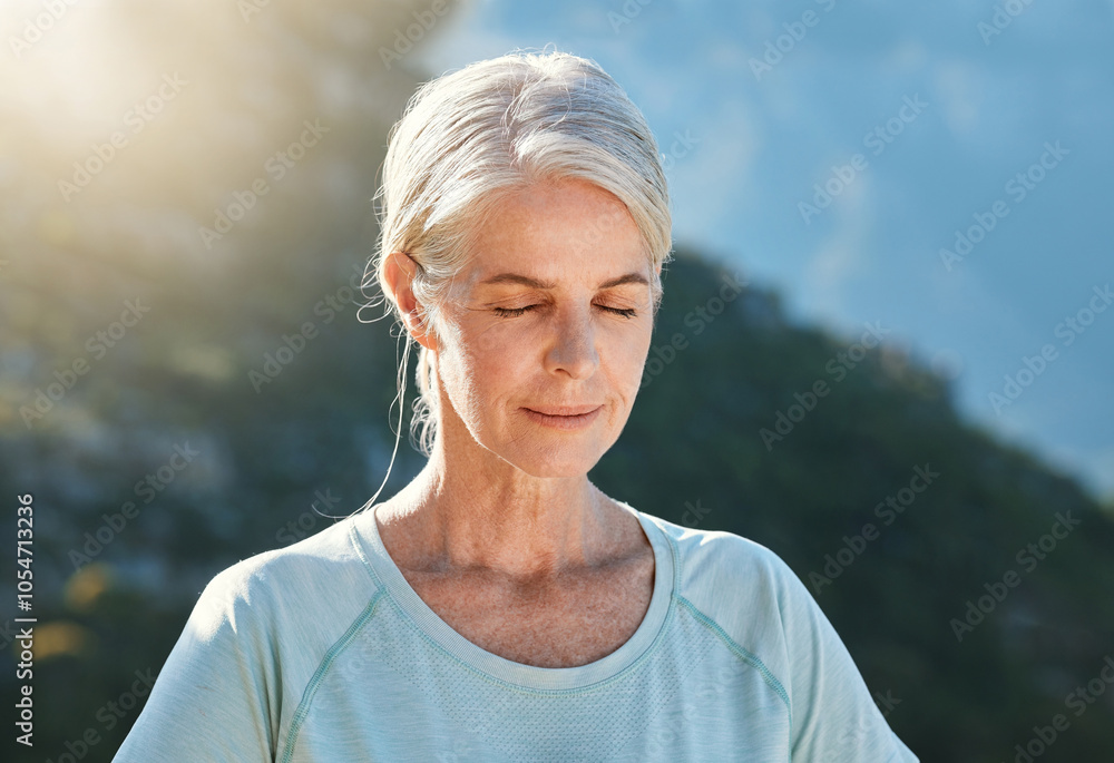 Senior, woman and relax with mountain for meditation, zen or inner peace for awareness in nature. Mature, female person or yogi with eyes closed for calm, stress relief or yoga in health and wellness Senior, woman and relax with mountain for meditation, zen or inner peace for awareness in nature. Mature, female person or yogi with eyes closed for calm, stress relief or yoga in health and wellness