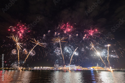 New Years fireworks display on Al Bandar Island looking across towards Yas Island, Abu Dhabi photo