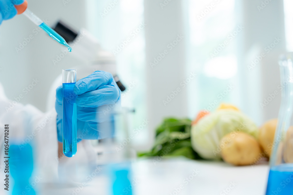 Scientist check chemical fruit residues in laboratory. Control experts inspect the concentration of chemical residues. hazards, standard, find prohibited substances, contaminate, Microbiologist. Scientist check chemical fruit residues in laboratory. Control experts inspect the concentration of chemical residues. hazards, standard, find prohibited substances, contaminate, Microbiologist.