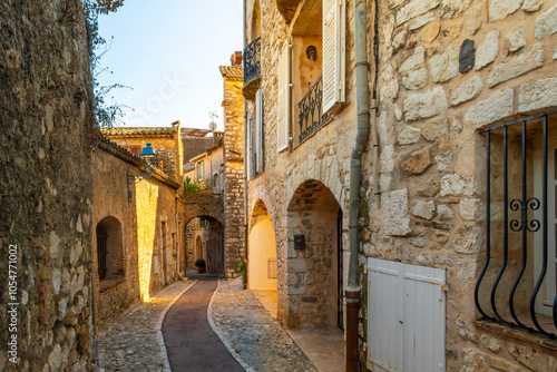 One of the many narrow cobblestone walkways  arched tunnels and paths in the hilltop medieval village of Saint-Paul de Vence  France.
