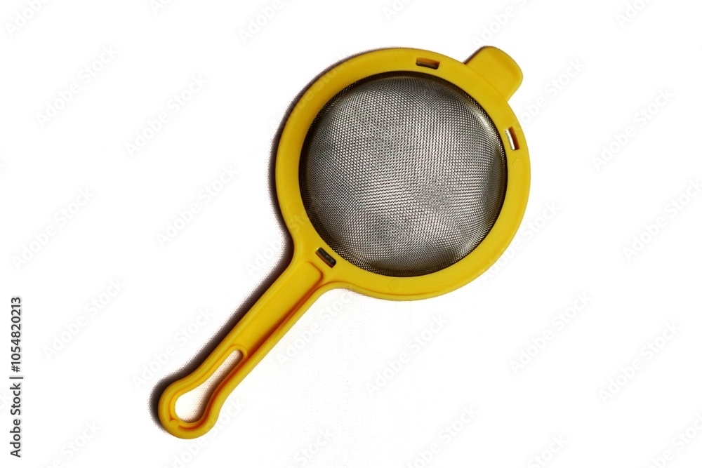 Fototapeta premium close up view of white isolated tea strainer