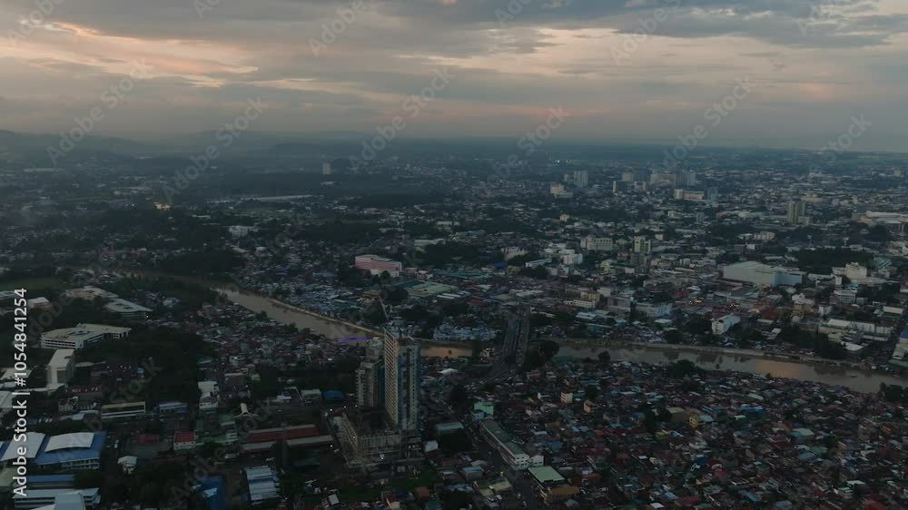 Aerial survey of residential area in riverside and buildings. Mindanao, Philippines. Aerial survey of residential area in riverside and buildings. Mindanao, Philippines.
