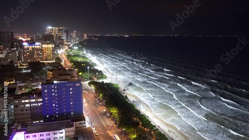 The coastal city of Vung Tau seen from above at night. This is a famous city for cultural tourism in southern Vietnam photo