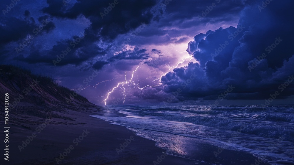 A beach at night during a lightning storm, with the lightning illuminating both the sky and the ocean waves. A beach at night during a lightning storm, with the lightning illuminating both the sky and the ocean waves.