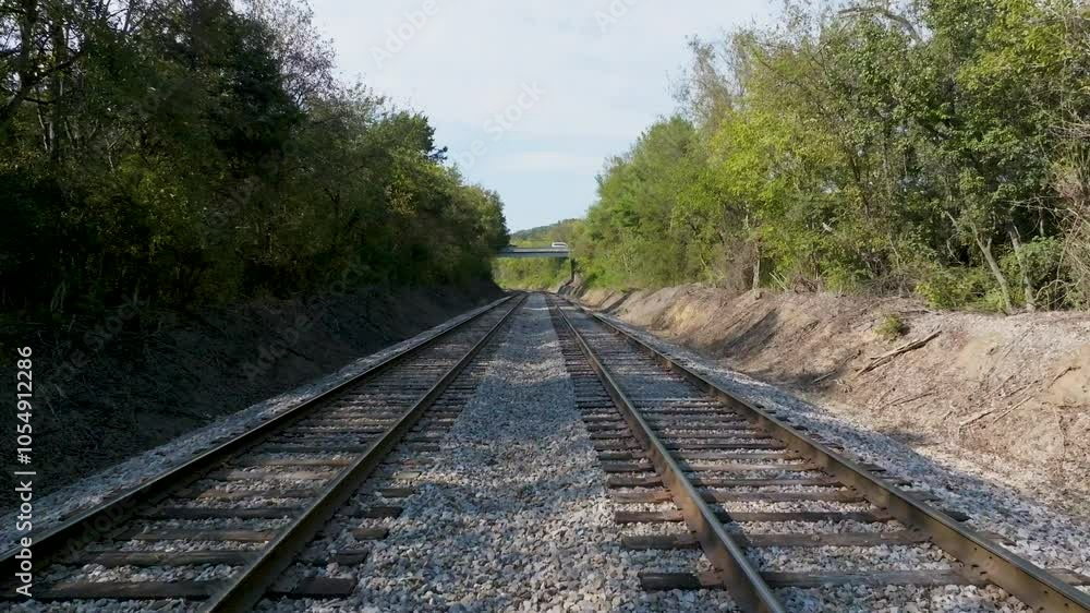 UAV low dolly forward over double railroad tracks. UAV low dolly forward over double railroad tracks.