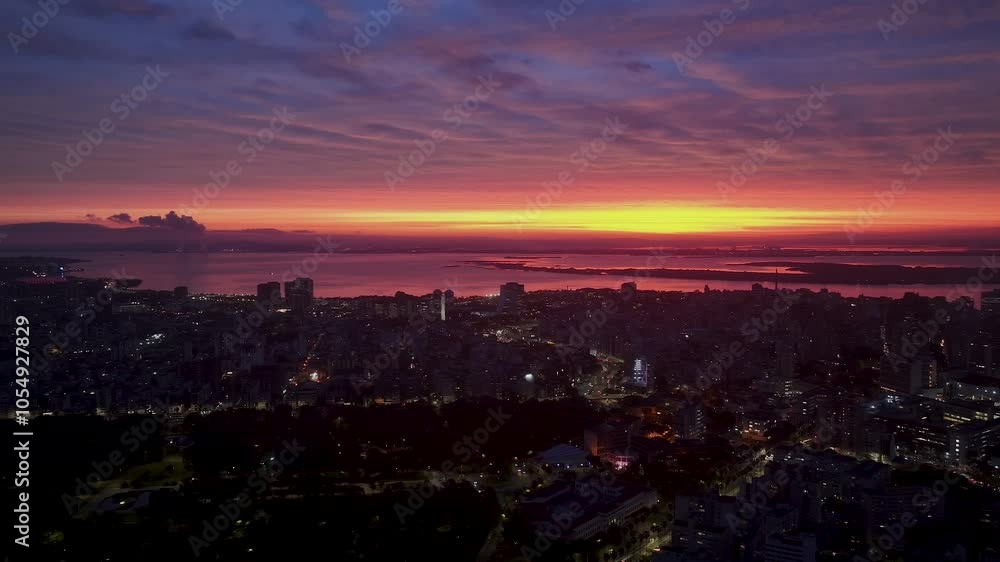 Sunset Porto Alegre Skyline At Porto Alegre Rio Grande Do Sul Brazil. Tropical River With A Scenic Forest Trees Viewed From Above. Building Infrastructure High Rise Building Busy. Sunset Porto Alegre Skyline At Porto Alegre Rio Grande Do Sul Brazil. Tropical River With A Scenic Forest Trees Viewed From Above. Building Infrastructure High Rise Building Busy.