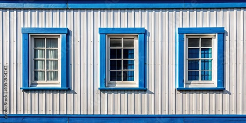 white and blue wooden building with windows