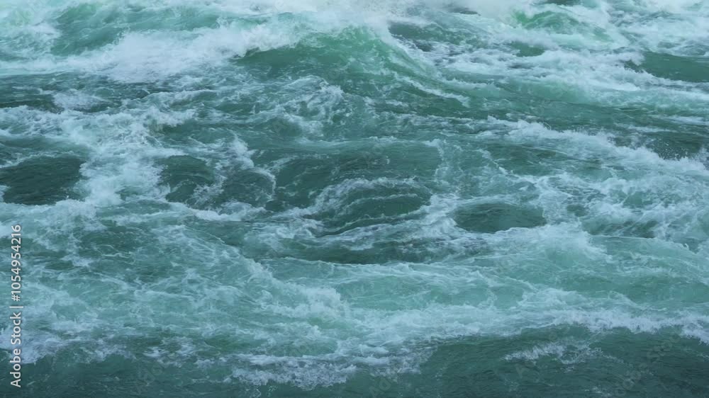 dynamic close-up view of swirling, churning water in fast-moving rapids, showcasing the power and beauty of nature's forceful currents, swirling dynamic close-up view of swirling, churning water in fast-moving rapids, showcasing the power and beauty of nature's forceful currents, swirling