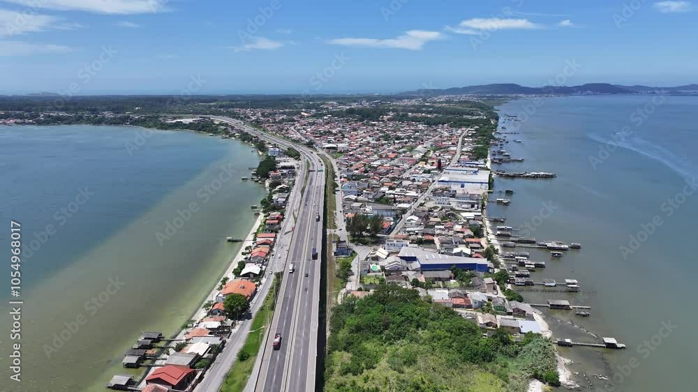 Laguna Skyline At Laguna Santa Catarina Brazil. Aerial View Of A Bustling City With High-Rise Buildings And Traffic. Paradise Landscape Leisure Beautiful. Leisure. Laguna Santa Catarina. Laguna Skyline At Laguna Santa Catarina Brazil. Aerial View Of A Bustling City With High-Rise Buildings And Traffic. Paradise Landscape Leisure Beautiful. Leisure. Laguna Santa Catarina.