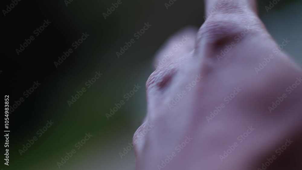 Moving Hand On A Bokeh Nature Backdrop. Selective Focus Shot Moving Hand On A Bokeh Nature Backdrop. Selective Focus Shot