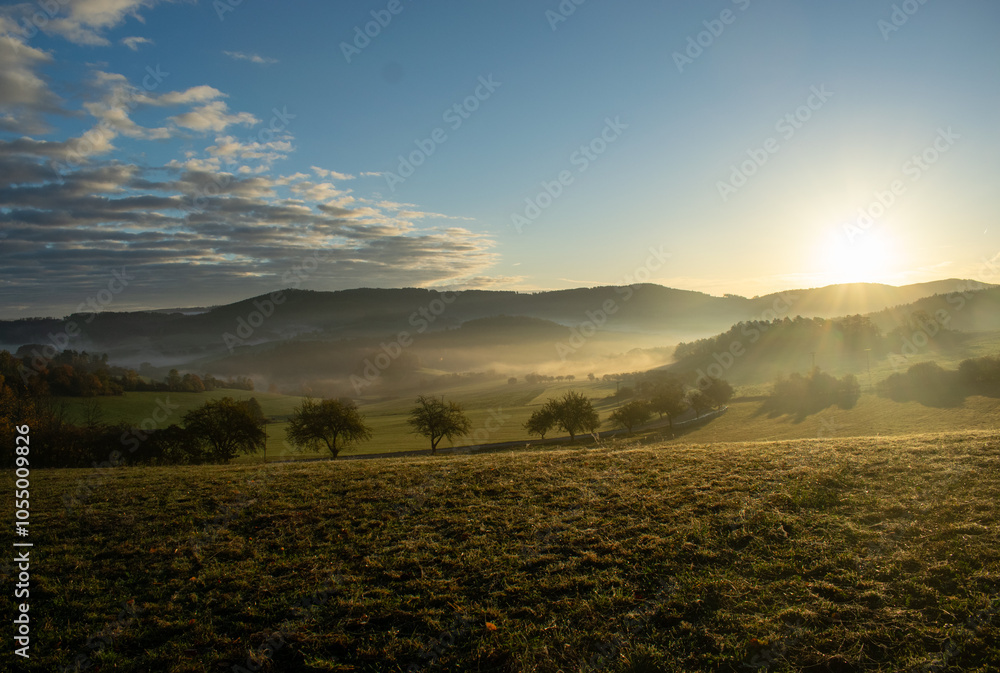 Obraz premium Beautiful autumn morning during the golden hour with fog, Sumava, Czech Republic