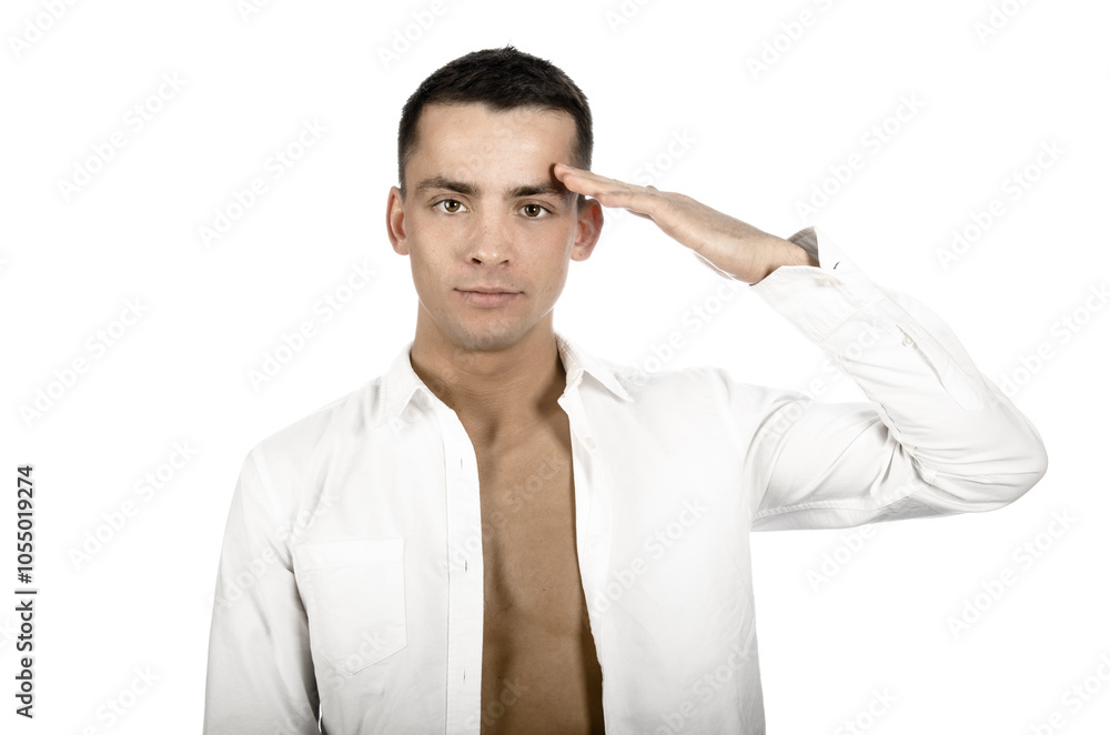 Young attractive man with athletic body posing in studio.