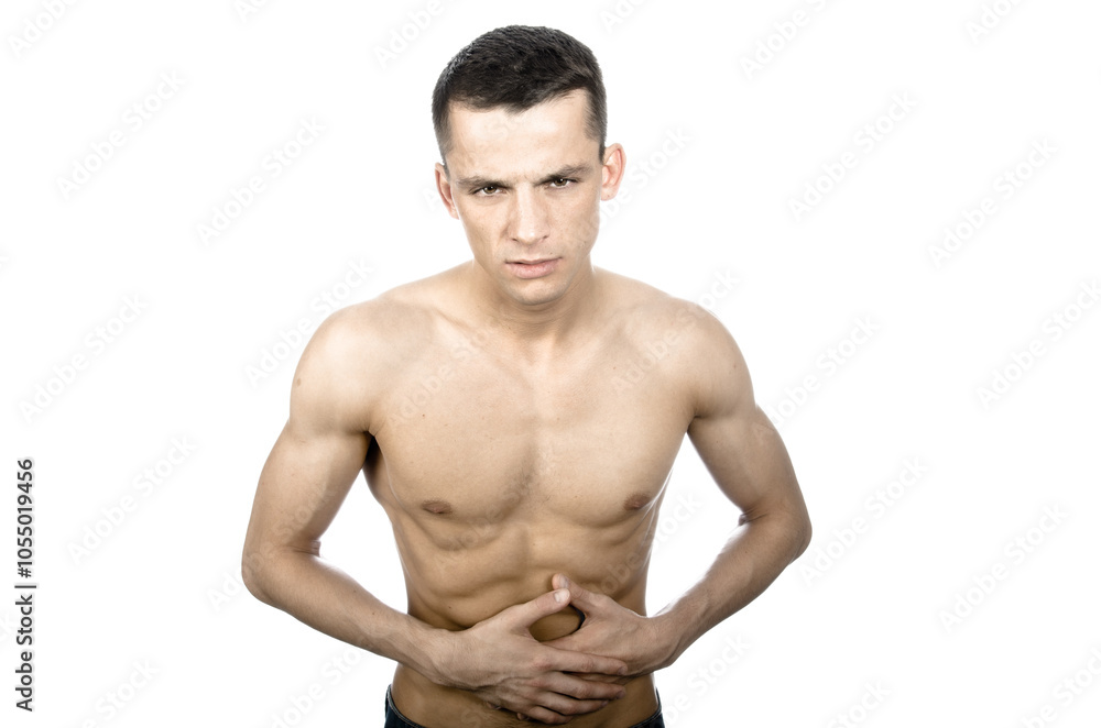 Young attractive man posing in studio. Pain and health problems. Young attractive man posing in studio. Pain and health problems.