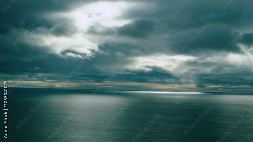 Man hiking, walking in the natural cliff, looking around, towards the sea, nature. Trekking with a backpack. Man hiking, walking in the natural cliff, looking around, towards the sea, nature. Trekking with a backpack.