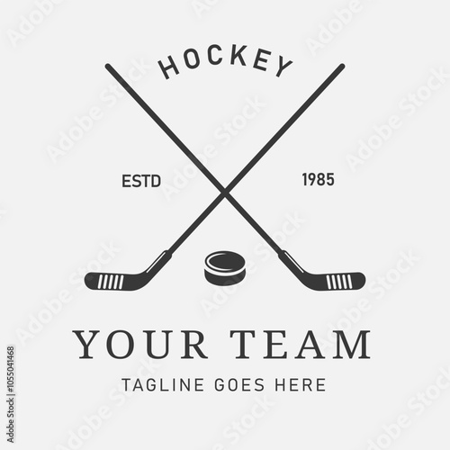 Vintage Hockey Logo Design with Two Crossed Sticks and Puck, suitable for Sports Club or Merchandise