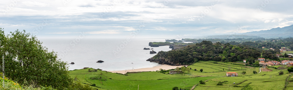 Picturesque panorama of Niembru village and the Toranda beach at the Atlantic coast of Asturias, Spain Picturesque panorama of Niembru village and the Toranda beach at the Atlantic coast of Asturias, Spain