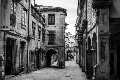 Historic medieval alleyway with old houses in the city center of Santiago de Compostela in Galizia