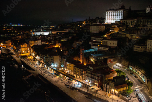 Wallpaper Mural Illuminated Porto city center at night with Ribeira do Porto and the Episcopal palace Torontodigital.ca