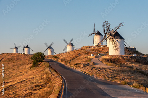 Iconic historic windmills in Consuegra at sunrise, Spain