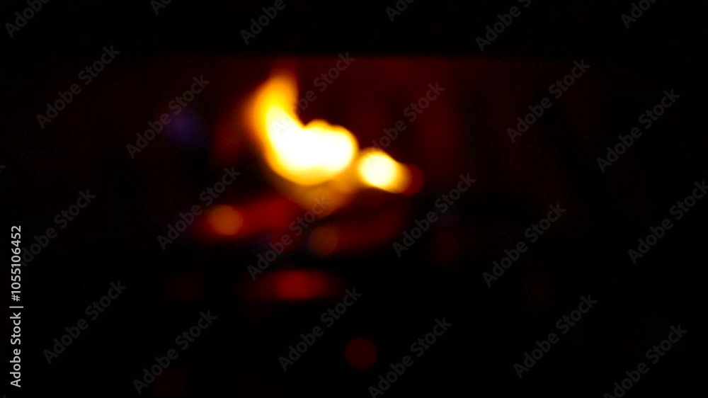 Glowing Fire in the Stone Fireplace Warm Cozy Fireplace with Real Wood Burning in it Winter and Christmas Holidays Concept Slow Motion Glowing Fire in the Stone Fireplace Warm Cozy Fireplace with Real Wood Burning in it Winter and Christmas Holidays Concept Slow Motion
