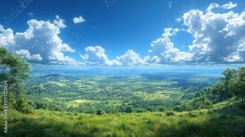 A panoramic view of a lush green landscape under a bright blue sky.