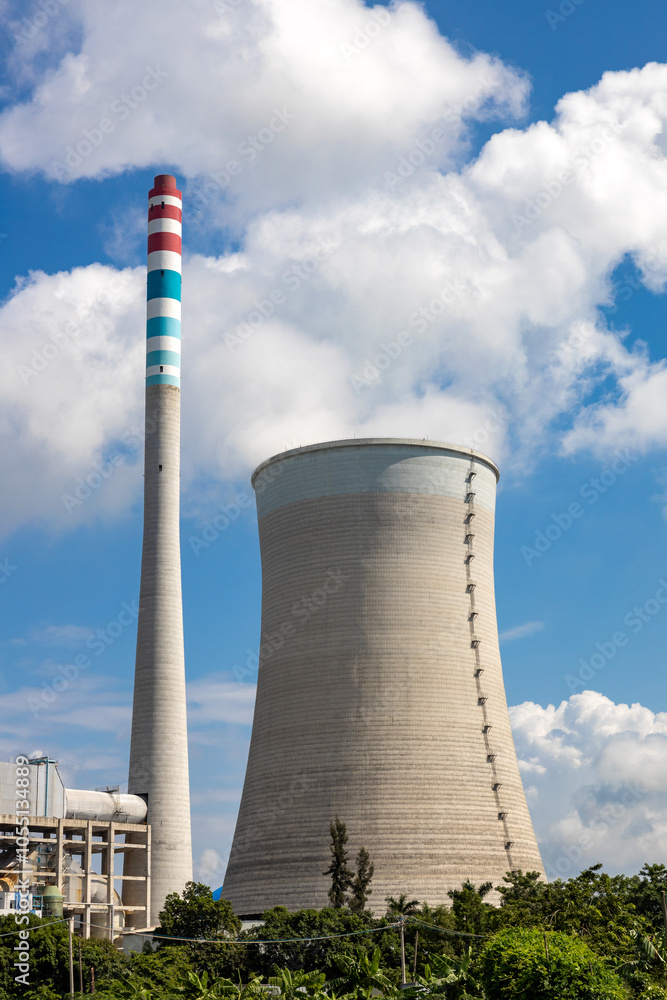 A thermal power station that emits steam under the scorching sun A thermal power station that emits steam under the scorching sun