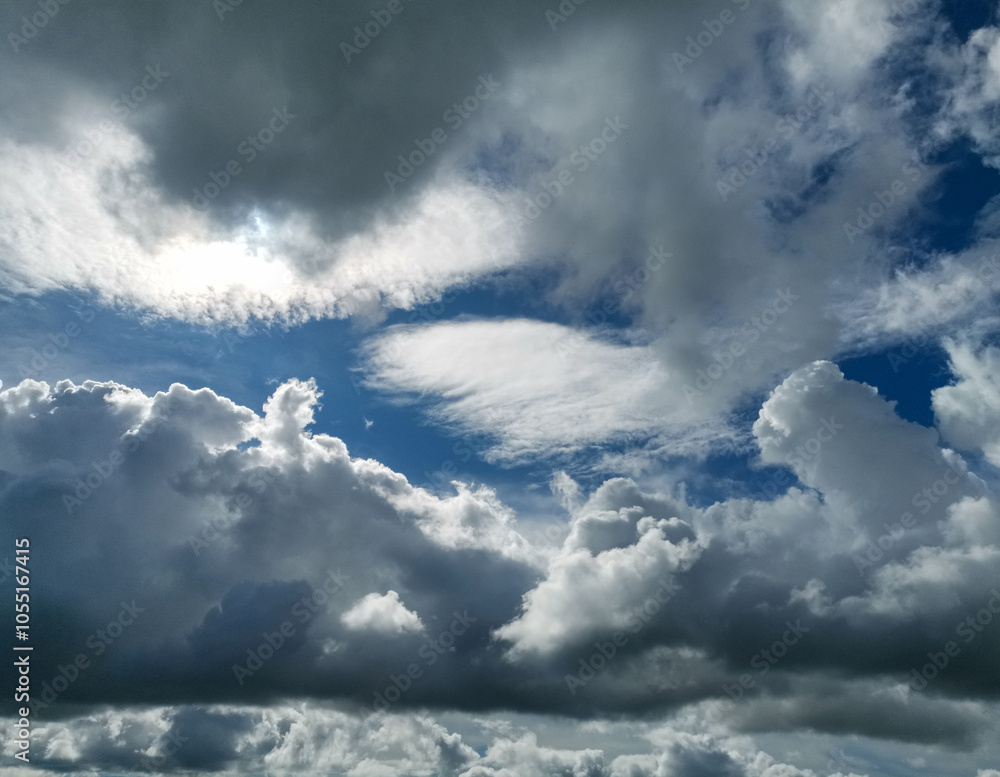 The sky is cloudy and the sun is shining through the clouds The sky is cloudy and the sun is shining through the clouds