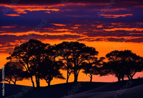 captivating dusk landscape vibrant fiery deep rich blues surrounded silhouettes trees rolling hills, sunset, colors, palette, orange, purple, scenery, sky