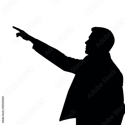 A businessman silhouette pointing towards a whiteboard